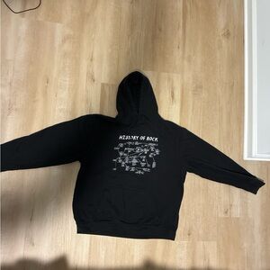 Black Hoodie with 'History of Rock' Graphic